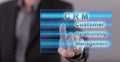 Man touching a crm concept on a touch screen Royalty Free Stock Photo