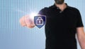 Man touching data security or data privacy icon on translucent screen with binary code Royalty Free Stock Photo