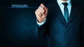 Man touching Sponsors text. Royalty Free Stock Photo