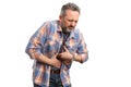 Man touching stomach with nauseous expression