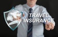 Man touching a travel insurance concept on a touch screen Royalty Free Stock Photo