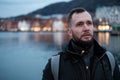 Man tourist against Tyskebryggen in Bergen, Norway