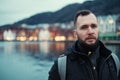 Man tourist against Tyskebryggen in Bergen, Norway