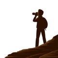 Man tourist with a camera in the mountains on white background.