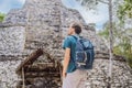 Man tourist at Coba, Mexico. Ancient mayan city in Mexico. Coba is an archaeological area and a famous landmark of