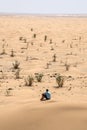 Man tourist in desert rub al khali Oman sitting sand view landscape 3