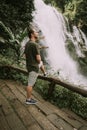 Man tourist enjoying Landscape of wachirathan waterfall, Inthanon National Park, Thailand Royalty Free Stock Photo