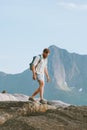 Man tourist hiking solo traveling in Norway vacations eco tourism in mountains Royalty Free Stock Photo