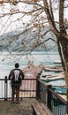 A man tourist standing for looking a view of Sun Moon Lake in Yuchi Township, Nantou County, Taiwan