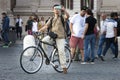 Man tourist taking a picture. A lot of tourists. Royalty Free Stock Photo