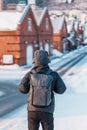 Man tourist Visiting in Hakodate, Traveler in Sweater sightseeing Kanemori Red Brick Warehouse with Snow in winter. landmark and Royalty Free Stock Photo