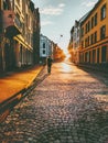 Man tourist walking in sunset street Royalty Free Stock Photo