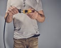 Man with toy car and electricity plug Royalty Free Stock Photo