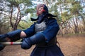 Man, in traditional armor for kendo, close-up