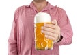 Man in traditional Bavarian shirt holds mug of beer Royalty Free Stock Photo