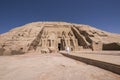 Man walking towards the entrance of Great Temple of Ramses II in Abu Simbel, Egypt Royalty Free Stock Photo