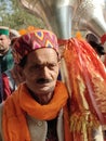 Man in traditional willen attire wearing himachali topi