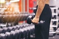 Man training hand holding dumbbells for burn fat in the body in the sport gym, Healthy lifestyle and sport concept