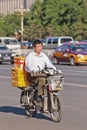 Man transports boxes on an e-bike, beijing, China