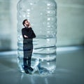 Man trapped inside plastic bottle. Plastic free concept