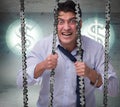 Man trapped in prison with dollars Royalty Free Stock Photo