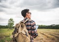 A man travel outdoor nature with storm cloudy background. Royalty Free Stock Photo