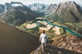 Man traveler alone standing on cliff