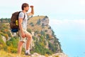 Man Traveler with backpack looking forward outdoor