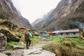 Man Traveler with backpack mountaineering Travel Lifestyle concept lake and mountains on background.