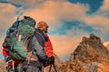 Man Traveler with big backpack mountaineering Travel Lifestyle concept lake and mountains on background, extreme vacations outdoor Royalty Free Stock Photo