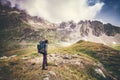Man Traveler with big backpack mountaineering Royalty Free Stock Photo