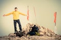 Man Traveler with hands raised on Mountain summit Traveling Mountaineering Royalty Free Stock Photo