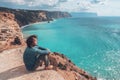 Man traveler over cold sea landscape Royalty Free Stock Photo