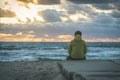 Man Traveler relaxing alone on beach seaside