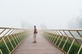 Man Traveler sightseeing Golden bridge at the top of the Ba Na Hills. Landmark and popular. Vietnam and Southeast Asia travel