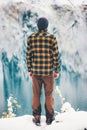 Man Traveler standing alone enjoy lake