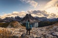 Man traveler standing on Nublet peak with rocky mountains and lake in Assiniboine provincial park Royalty Free Stock Photo