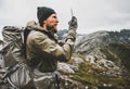 Man traveler using smartphone gps navigator