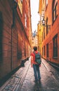 Man traveler walking alone in Stockholm narrow street Royalty Free Stock Photo
