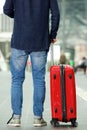 Man with traveling bag standing at train station Royalty Free Stock Photo