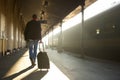 Man traveling with bag at train station Royalty Free Stock Photo