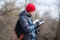 Man traveling in a pine forest