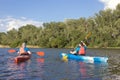 Man traveling on the river in a kayak . Royalty Free Stock Photo