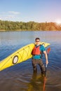 Man traveling on the river in a kayak . Royalty Free Stock Photo