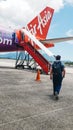 Man Traveling walking to airplane