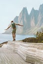 Man traveller exploring Norway traveling solo summer vacations active healthy lifestyle Royalty Free Stock Photo