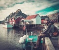 Man traveller in Reine village, Norway