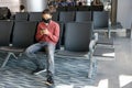 Man traveller wearing mask in airport Royalty Free Stock Photo