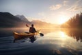 A man travelling in a kayak in a lake at sunrise in mountains is a peaceful and serene scene that captures the beauty