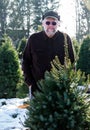 Man at a tree farm Royalty Free Stock Photo